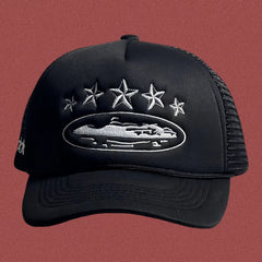 Corteiz Black Trucker Hat with Silver Stars and Cruise Ship Graphic
